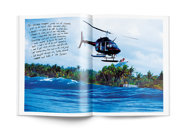 Helicopter photograph of Taj Burrow surfing